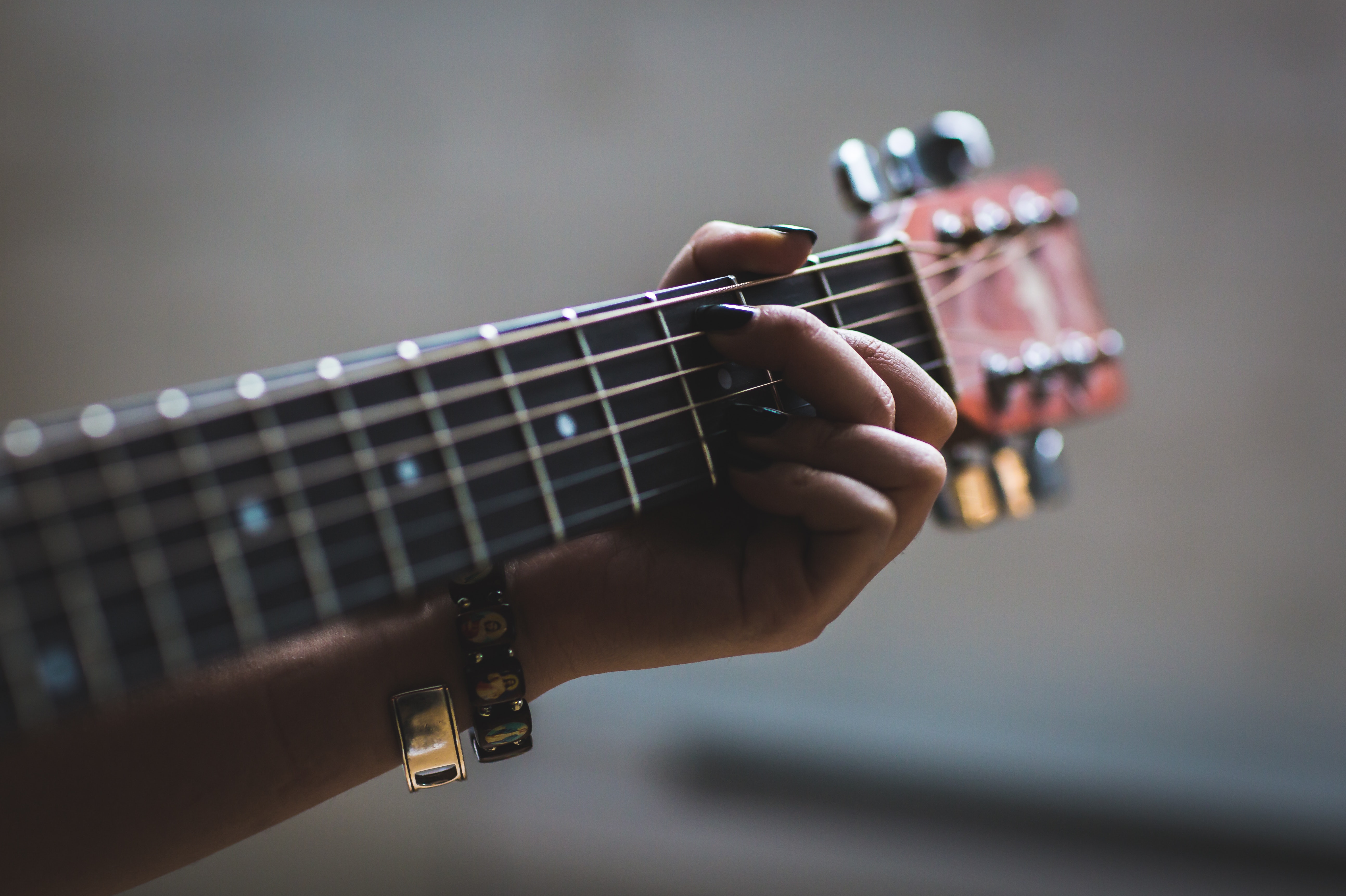 blur-bowed-stringed-instrument-close-up-374698.jpg
